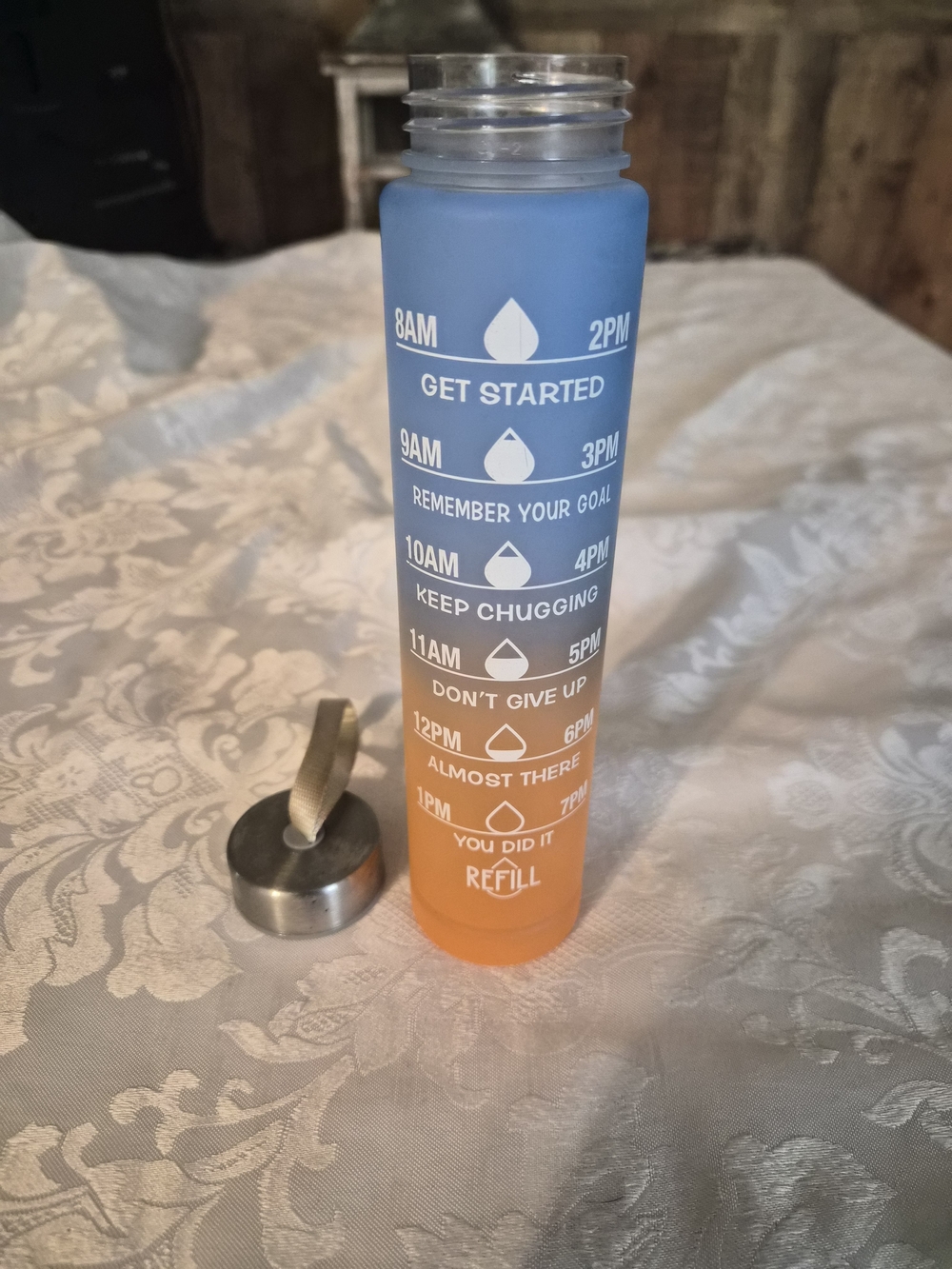 Gradient Blue-to-Orange Motivational Hydration Bottle